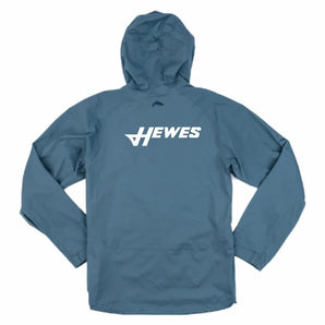 Back of a slate blue jacket with a white hewes logo across it.