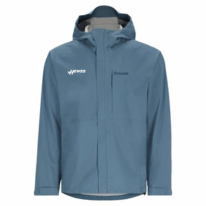 Front of a slate blue jacket with a white hewes logo on the right chest. 