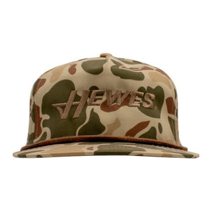 Camo-patterned baseball cap with 'Hewes' logo.