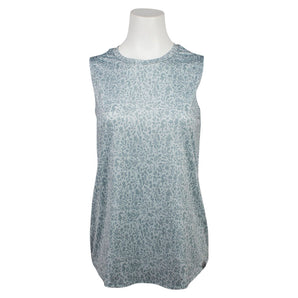 Sleeveless performance shirt with a light blue floral print pattern.