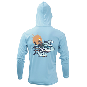Back of a light blue hooded long sleeve with a graphic of three fish swimming below a sun, with a pelican in the mid-ground. 