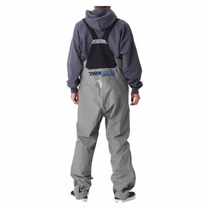 Man wearing a pair of grey fishing bibs from behind, printed in blue with the pathfinder logo on the lower back.